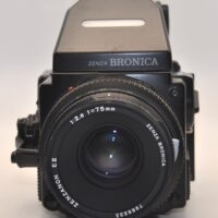 Zenza Bronica + Zenzanon EII 75mm f2.8 lens. Includes metered eye level prism finder with waist level finder and film back..